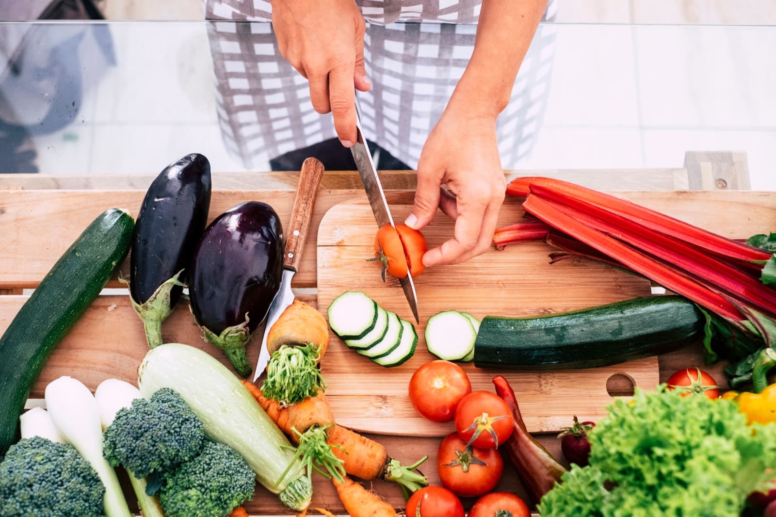 Fresh vegetables being prepared on a chopping board